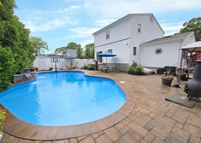 53 Admiral St, Port Jefferson Station, NY 11776 - view of pool featuring a fenced backyard, a patio, a gazebo, and outdoor dining space