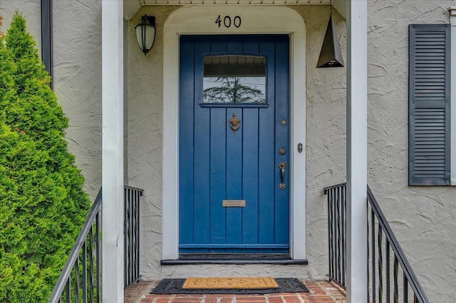 400 Manor Ridge Rd, Pelham, NY 10803 - doorway to property with board and batten siding