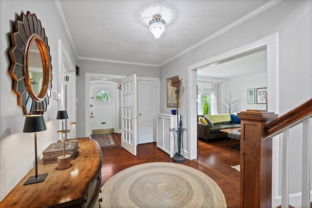 400 Manor Ridge Rd, Pelham, NY 10803 - entrance foyer featuring wood finished floors, crown molding, and stairway