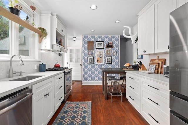 400 Manor Ridge Rd, Pelham, NY 10803 - kitchen featuring stainless steel appliances, light countertops, white cabinets, recessed lighting, and dark wood-type flooring