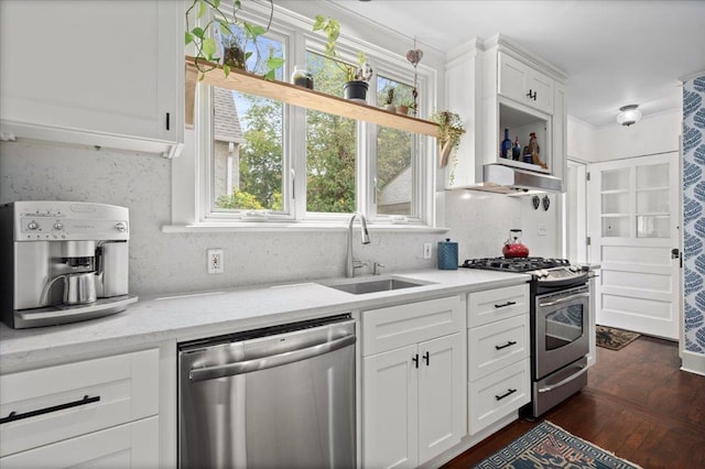 400 Manor Ridge Rd, Pelham, NY 10803 - kitchen with appliances with stainless steel finishes, healthy amount of natural light, dark wood finished floors, and white cabinetry