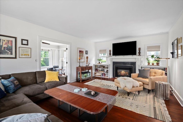 400 Manor Ridge Rd, Pelham, NY 10803 - living room featuring dark wood-style flooring and a glass covered fireplace