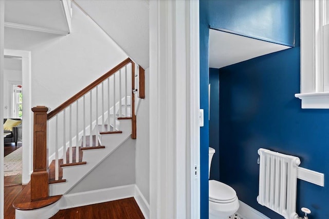 400 Manor Ridge Rd, Pelham, NY 10803 - staircase featuring radiator, wood finished floors, and crown molding