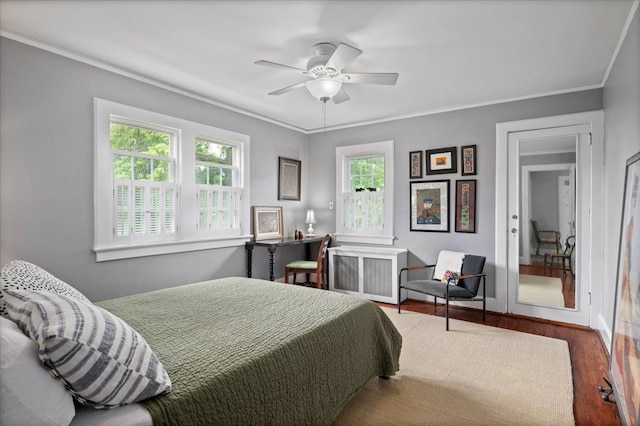 400 Manor Ridge Rd, Pelham, NY 10803 - bedroom with wood finished floors, crown molding, radiator heating unit, and ceiling fan