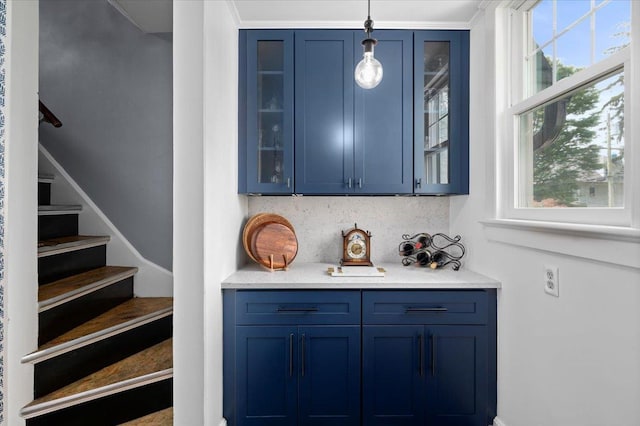 400 Manor Ridge Rd, Pelham, NY 10803 - bar area featuring stairway, backsplash, and decorative light fixtures