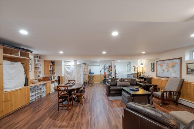 156 E Maujer St, Valley Stream, NY 11580 - living area featuring wood finished floors, a wainscoted wall, recessed lighting, an AC wall unit, and wooden walls