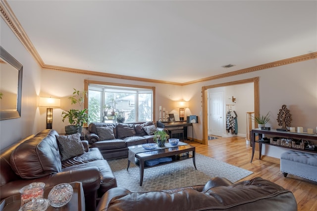 156 E Maujer St, Valley Stream, NY 11580 - living room with light wood finished floors and ornamental molding