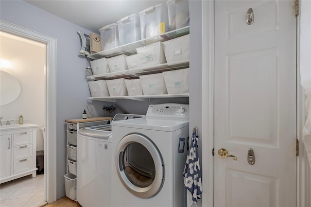 156 E Maujer St, Valley Stream, NY 11580 - laundry area featuring washing machine and dryer