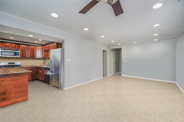 15 Oliver Pl, Staten Island, NY 10314 - kitchen with stainless steel appliances, ornamental molding, ceiling fan, recessed lighting, and tasteful backsplash