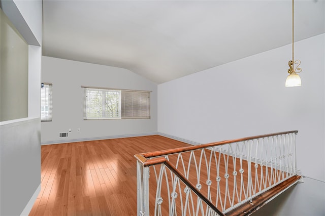 15 Oliver Pl, Staten Island, NY 10314 - corridor featuring lofted ceiling, wood finished floors, and baseboards
