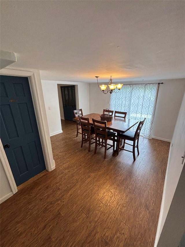103 Continental Rd, Napanoch, NY 12458 - dining space with dark wood-style floors, baseboards, and a chandelier
