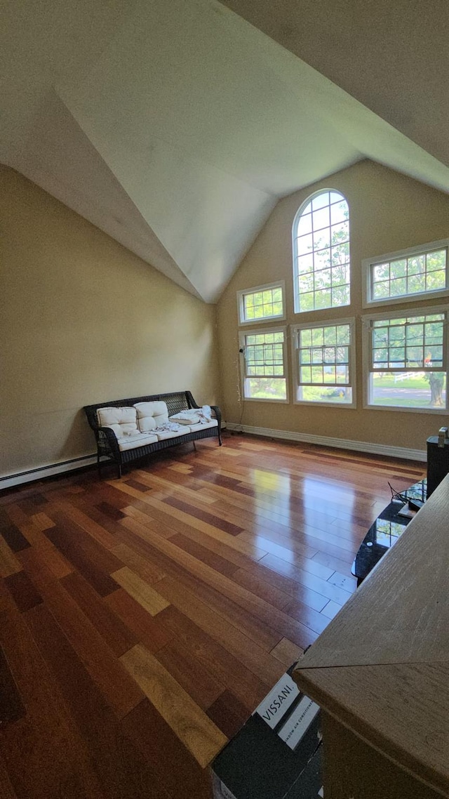 943 Macarthur St, Bohemia, NY 11716 - additional living space featuring vaulted ceiling and wood finished floors