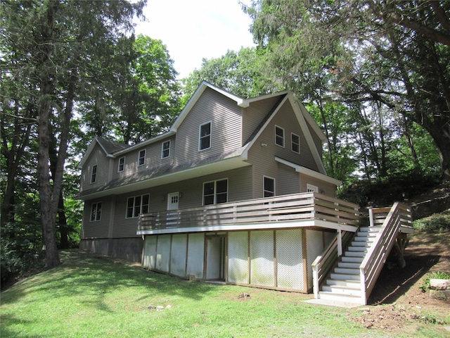 101 Bundy Hill Rd, Holmes, NY 12531 - back of property with stairs, a wooden deck, and a lawn
