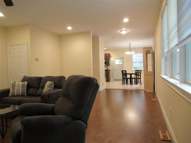 101 Bundy Hill Rd, Holmes, NY 12531 - living room featuring dark wood-type flooring, recessed lighting, and a chandelier