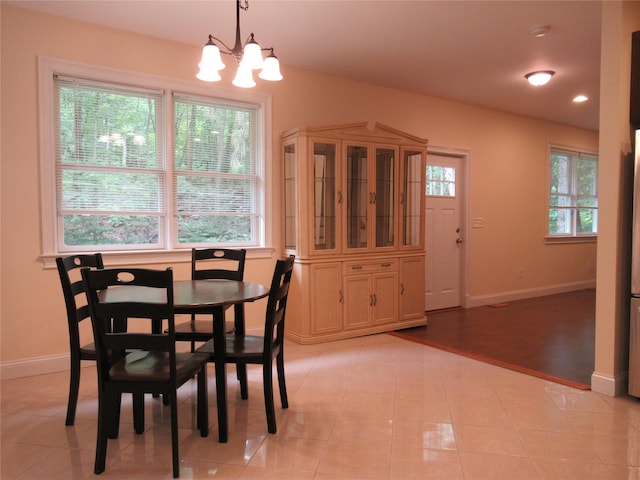 101 Bundy Hill Rd, Holmes, NY 12531 - dining room with a chandelier, light tile patterned floors, and recessed lighting