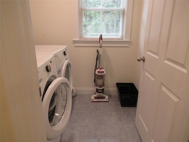 101 Bundy Hill Rd, Holmes, NY 12531 - laundry area with washing machine and dryer and light tile patterned floors