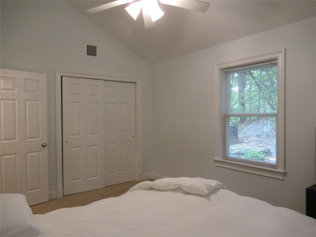 101 Bundy Hill Rd, Holmes, NY 12531 - carpeted bedroom featuring multiple windows, vaulted ceiling, a closet, and ceiling fan