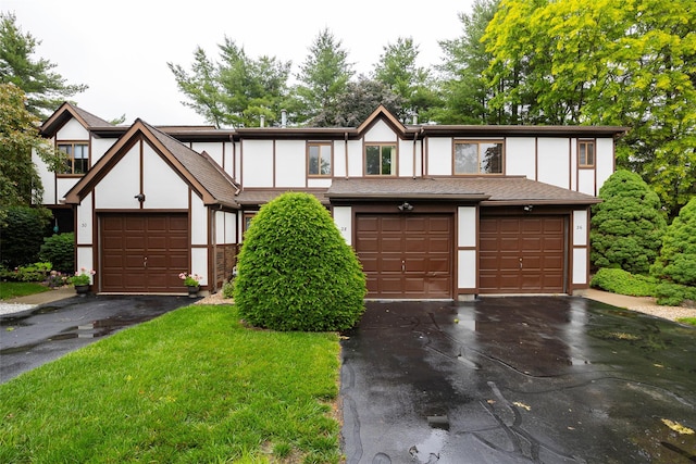 28 Amber Ct, Poughkeepsie, NY 12603 - view of front of property featuring stucco siding and asphalt driveway