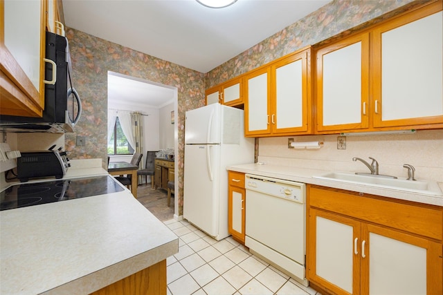 28 Amber Ct, Poughkeepsie, NY 12603 - kitchen featuring white appliances, wallpapered walls, a sink, light countertops, and ornamental molding