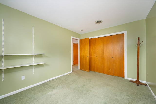 28 Amber Ct, Poughkeepsie, NY 12603 - unfurnished bedroom with carpet flooring, baseboards, and a closet