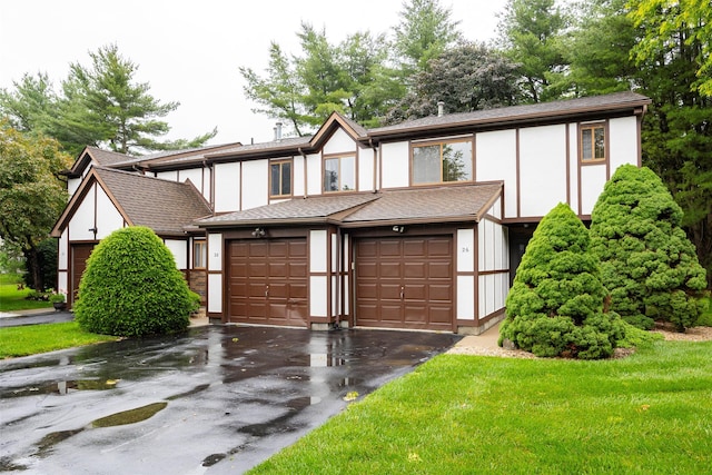 28 Amber Ct, Poughkeepsie, NY 12603 - english style home with driveway, stucco siding, and an attached garage