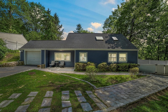 59 Oslo Dr, Yorktown Heights, NY 10598 - cape cod home featuring a garage, asphalt driveway, and a shingled roof