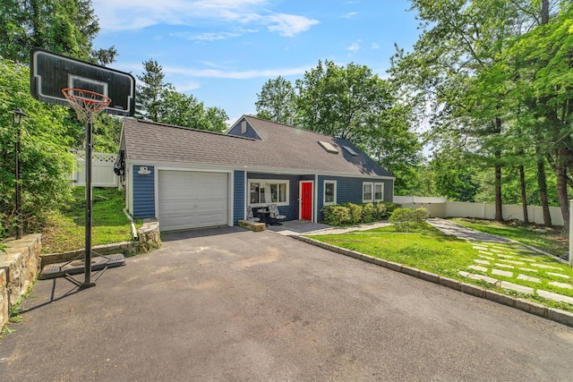 59 Oslo Dr, Yorktown Heights, NY 10598 - view of front of house with a garage, driveway, and roof with shingles