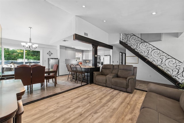 59 Oslo Dr, Yorktown Heights, NY 10598 - living room with a chandelier, light wood-style flooring, and recessed lighting