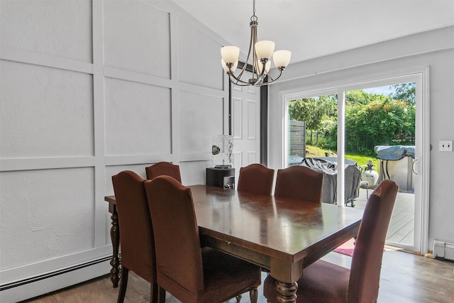 59 Oslo Dr, Yorktown Heights, NY 10598 - dining room with baseboard heating and a chandelier