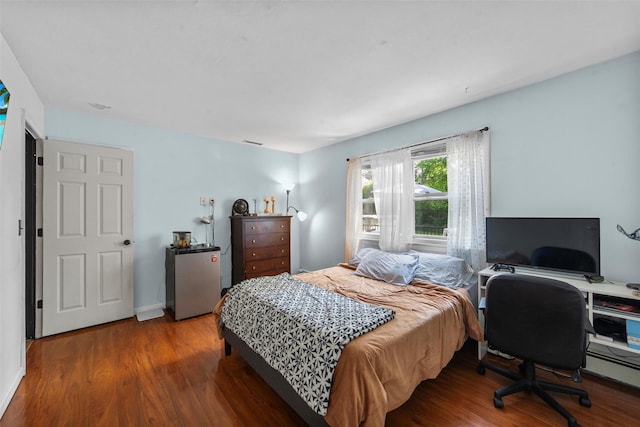 59 Oslo Dr, Yorktown Heights, NY 10598 - bedroom featuring wood finished floors, baseboards, and a desk