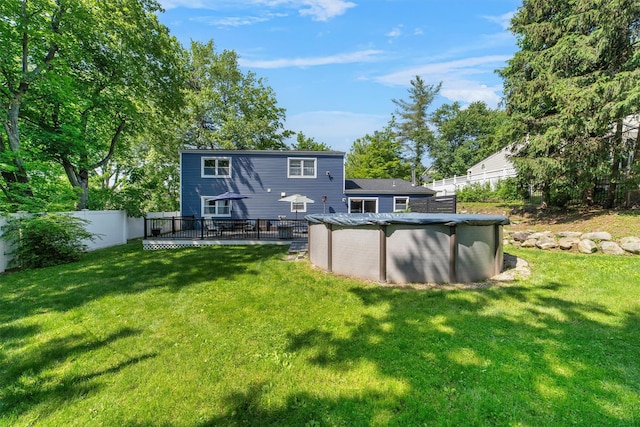 59 Oslo Dr, Yorktown Heights, NY 10598 - rear view of property with a covered pool