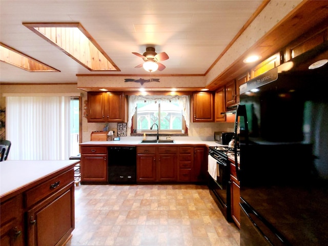 43 Last Rd, Montgomery, NY 10941 - kitchen with black appliances, light countertops, a ceiling fan, and brown cabinets