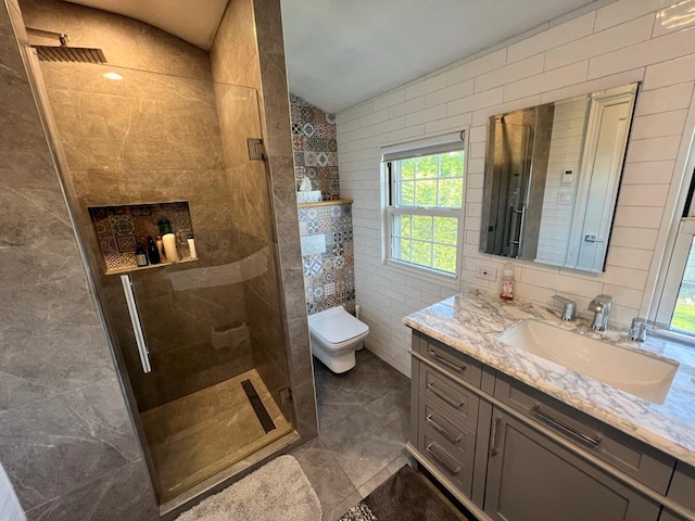 101 Oswego St, North Bellmore, NY 11710 - bathroom featuring vanity, walk in shower, lofted ceiling, toilet, and tile walls