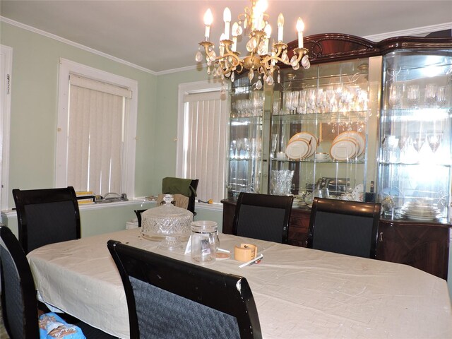 713 Colonial St, Uniondale, NY 11553 - dining area with a chandelier and crown molding