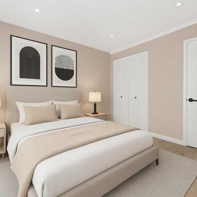 642 Locust St Unit 2D, Mount Vernon, NY 10552 - bedroom with wood finished floors, recessed lighting, a closet, baseboards, and ornamental molding