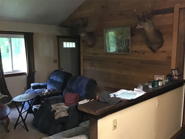 1814 Rte 199, Stanfordville, NY 12581 - living area featuring wood walls, lofted ceiling, and carpet floors