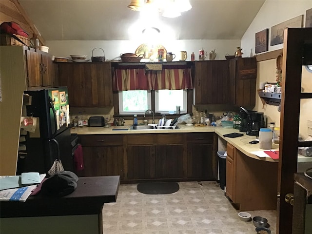 1814 Rte 199, Stanfordville, NY 12581 - kitchen featuring freestanding refrigerator, a sink, lofted ceiling, light countertops, and light flooring