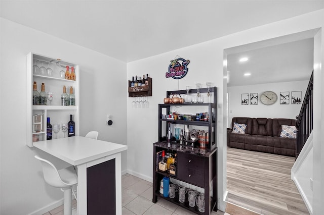 98 Greenhaven Rd, Poughquag, NY 12570 - bar area with light tile patterned floors and baseboards
