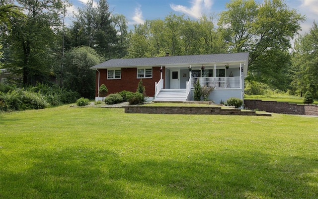 52 Old Chester Rd, Goshen, NY 10924 - single story home featuring a porch, a front yard, and brick siding