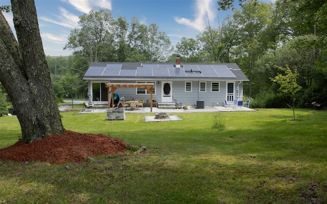 52 Old Chester Rd, Goshen, NY 10924 - back of house featuring an outdoor fire pit, a patio, a lawn, and a chimney