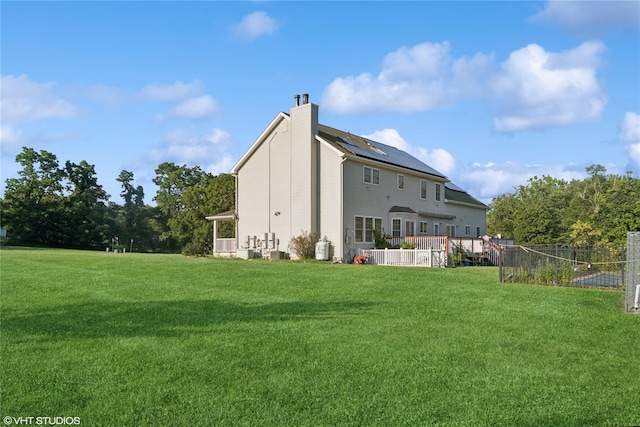 10 Wyllys Ct, Rock Tavern, NY 12575 - rear view of property featuring a chimney