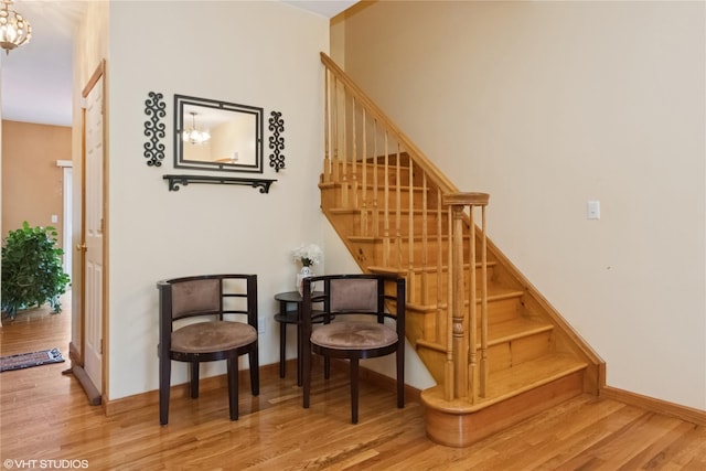 10 Wyllys Ct, Rock Tavern, NY 12575 - stairway featuring wood finished floors and a chandelier