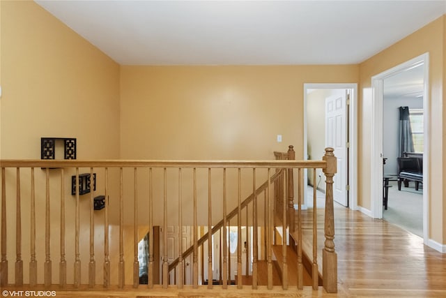 10 Wyllys Ct, Rock Tavern, NY 12575 - corridor with an upstairs landing and wood finished floors