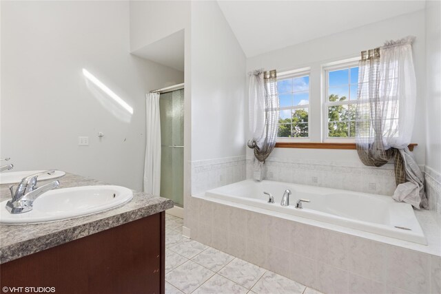10 Wyllys Ct, Rock Tavern, NY 12575 - full bathroom with a bath, tile patterned flooring, a stall shower, lofted ceiling, and double vanity