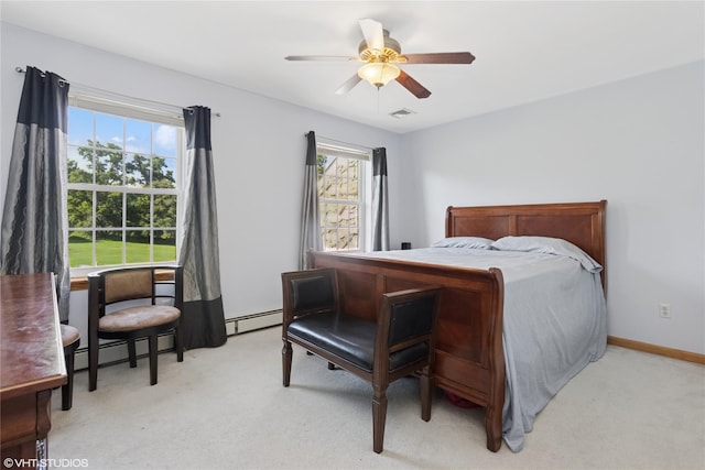 10 Wyllys Ct, Rock Tavern, NY 12575 - bedroom featuring light carpet, baseboard heating, and a ceiling fan