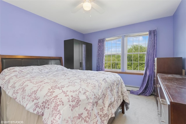 10 Wyllys Ct, Rock Tavern, NY 12575 - bedroom featuring carpet floors, a baseboard heating unit, and ceiling fan