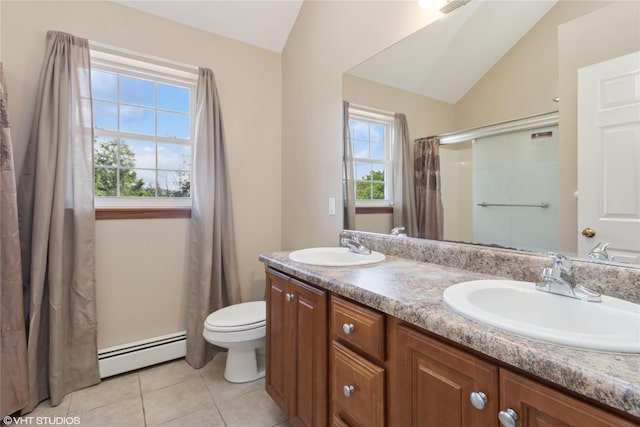 10 Wyllys Ct, Rock Tavern, NY 12575 - bathroom with baseboard heating, vaulted ceiling, tile patterned flooring, double vanity, and a shower with curtain