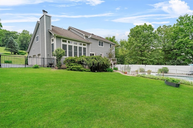 32 Woodcrest Ln, Goshen, NY 10924 - rear view of house featuring a chimney