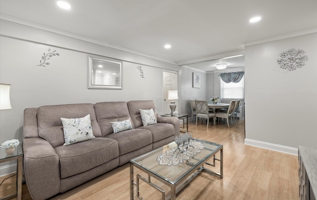 155-03 79th St Unit 188, Howard Beach, NY 11414 - living room with ornamental molding, light wood finished floors, recessed lighting, and baseboards