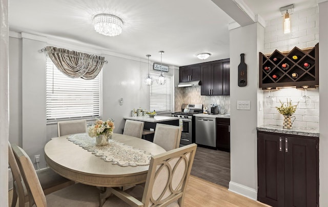 155-03 79th St Unit 188, Howard Beach, NY 11414 - dining area featuring a chandelier and light wood-style flooring